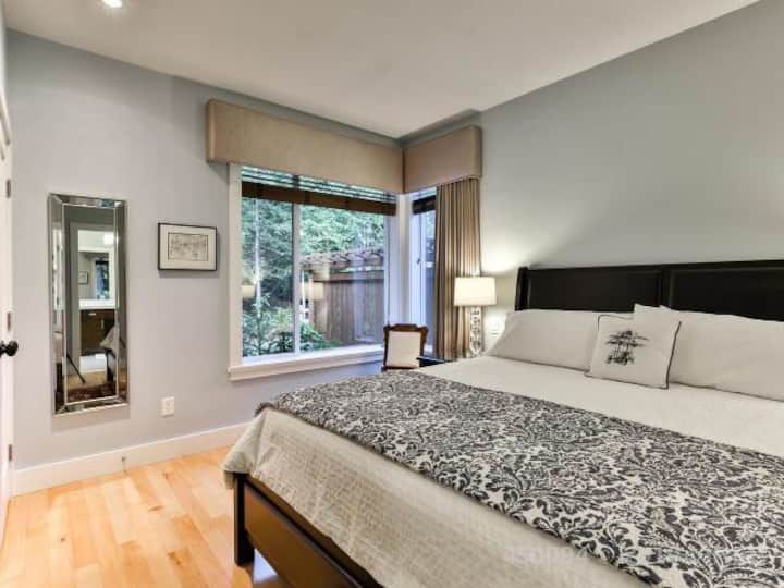 Master bedroom with a king bed.