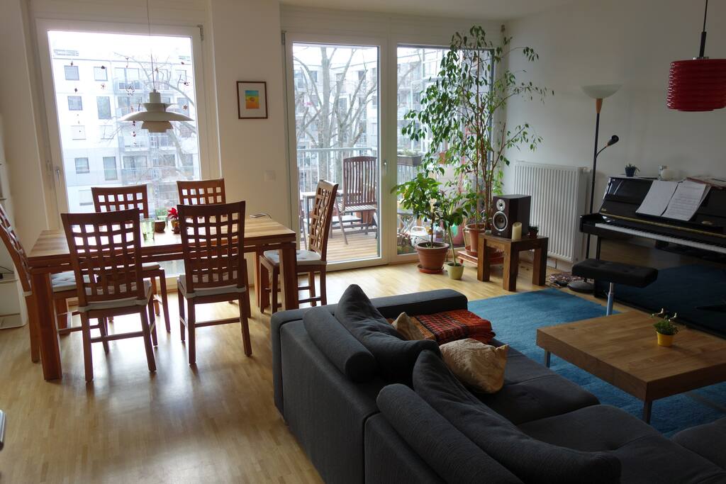 living room with piano