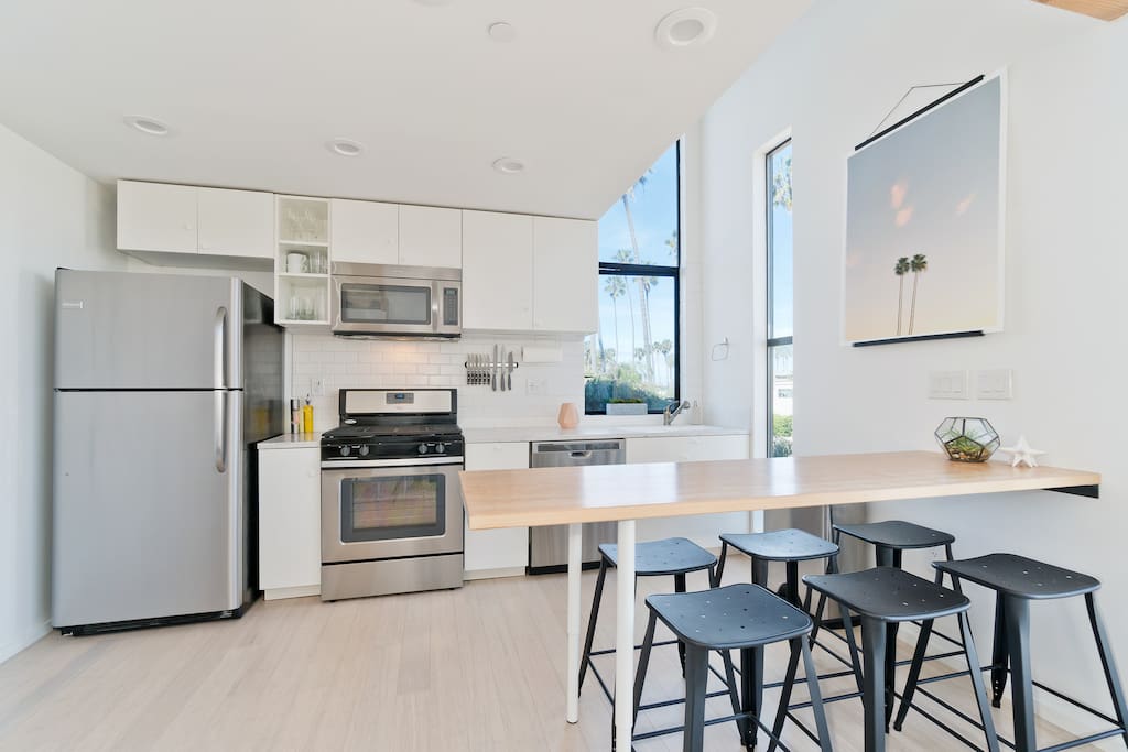 Features a fully equipped kitchen.