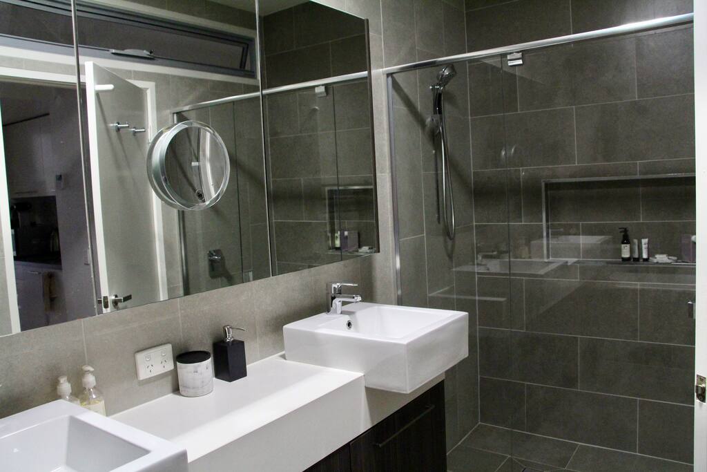 Bathroom, double size shower, one shower head.
