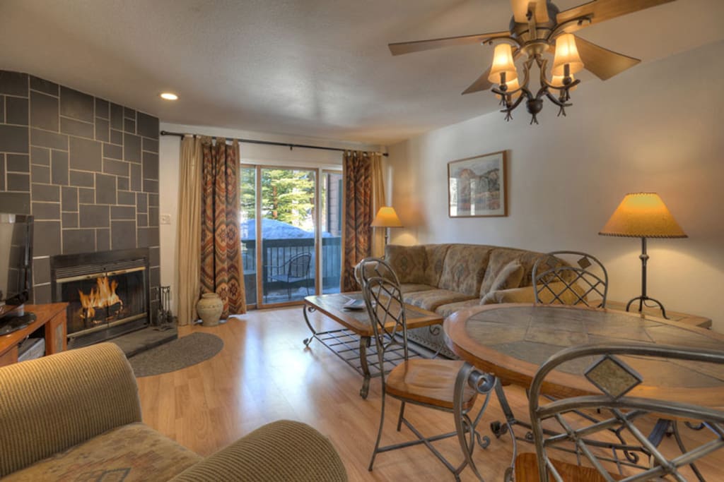 Living room w fireplace and mountain views at Durango Colorado vacation rental home at Silverpick Condominiums