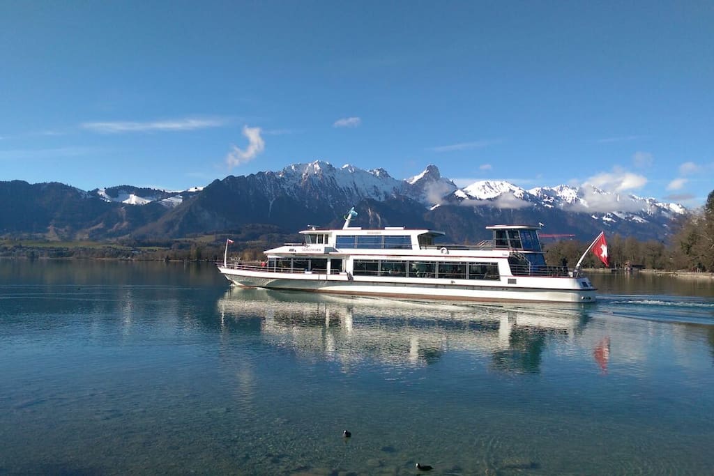 Take the boat and enjoy lake and mountains. The closest boat Station is only a 10min walk away.