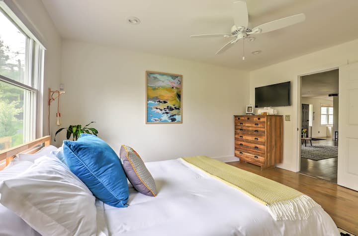 Bedroom 2 has a queen bed, nightstands, two large closets, a dresser and a 40 inch flat screen TV.