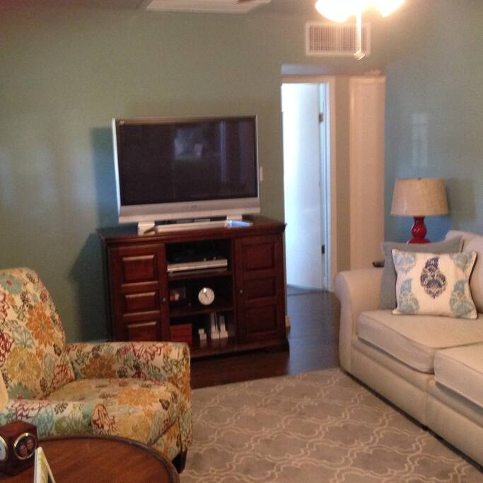 Large Pottery Barn sofa, recliner, 42" TV with dish network. Also has Roku, a Dave, a DVD player, and many movie dvds, including Disney.