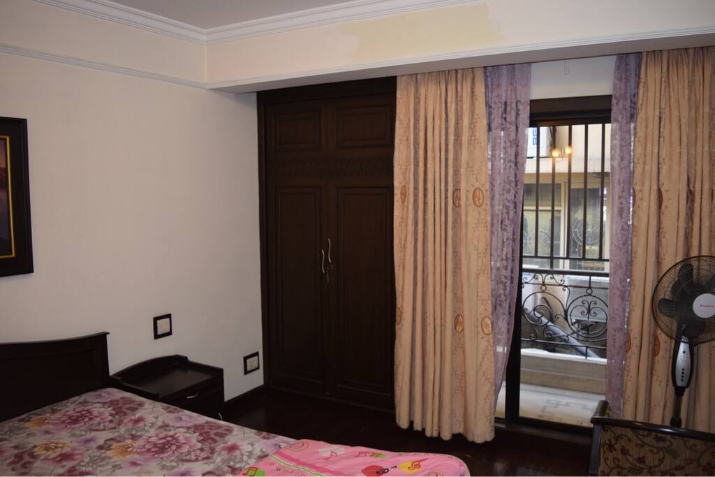 Closest + Balcony in Guest Bedroom