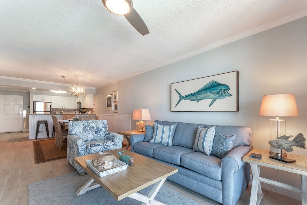 Bull nose dolphin painting by local artist highlights the living area.