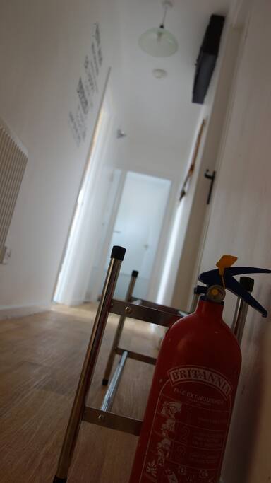light hall way fitted with fire extinguisher