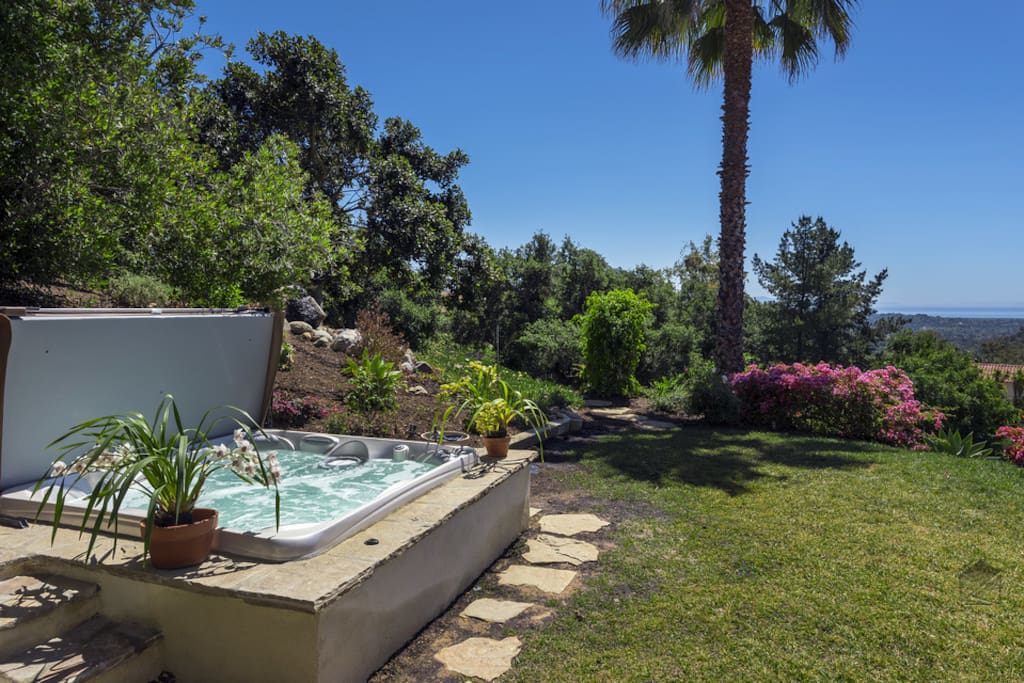 The hot tub is right downstairs and has gorgeous views - like the rest of the home.