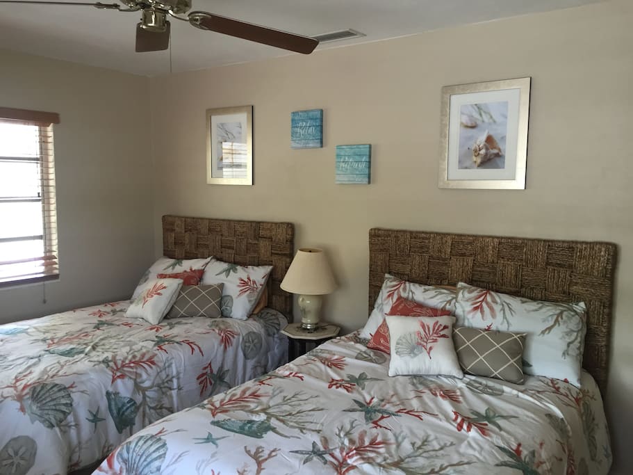 2nd room has two full size beds and flat screen tv. Waterview room