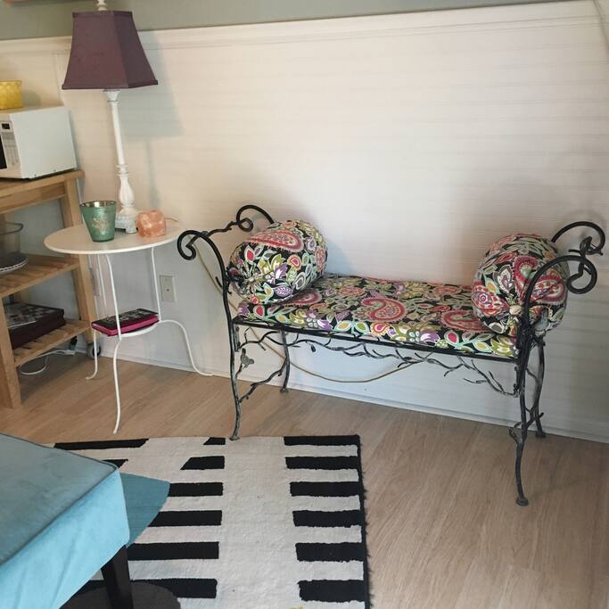 We have a nice bench for your luggage or for lounging.
