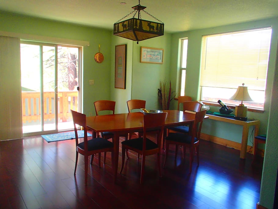 another view of the dining room with slider to deck.