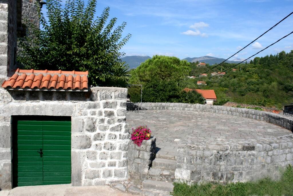 Entrance to the house next to the nationaly protected monument in past used for making of wheat.