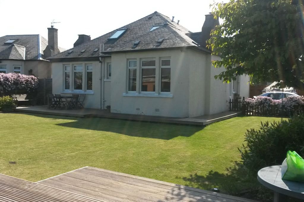 Large rear garden with 2 decking areas.