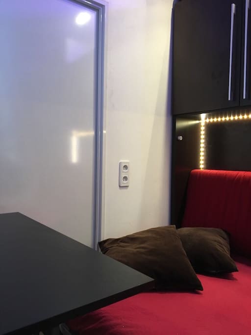 If you are in the room with the table (opened position)