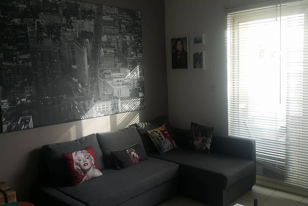 living room and the sofa can turn into a double bed