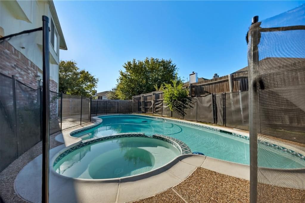 This is the back of the house, the panels to protect the pool and hot tub are removable for your comfort.