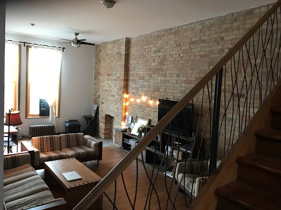 Lounge view from Kitchen over staircase.