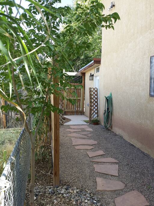 Separate entrance and gated yard area suitable for a small to medium dog. (Dog door included).