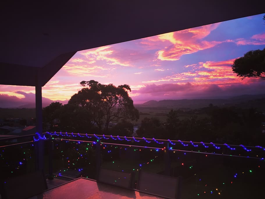 Watch many gorgeous sunsets from the large back verandah overlooking the lush, green farmland and mountains.