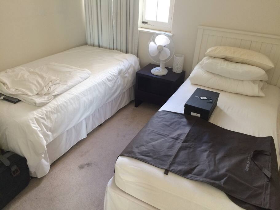 Comfortable & Clean bedroom with 2 single beds and cupboards