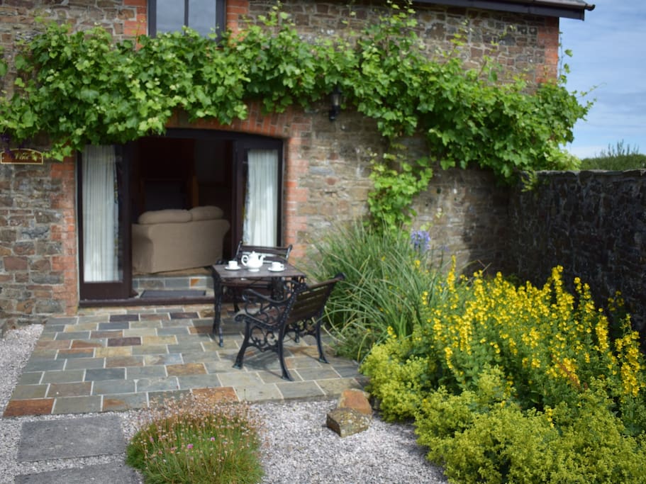 The Seating Area Outside Vine Cottage from the Inner Courtyard