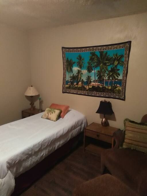 Large room with "Island Oasis" theme.