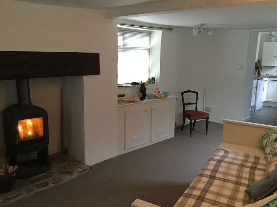 Sitting Room with day bed and wood fire