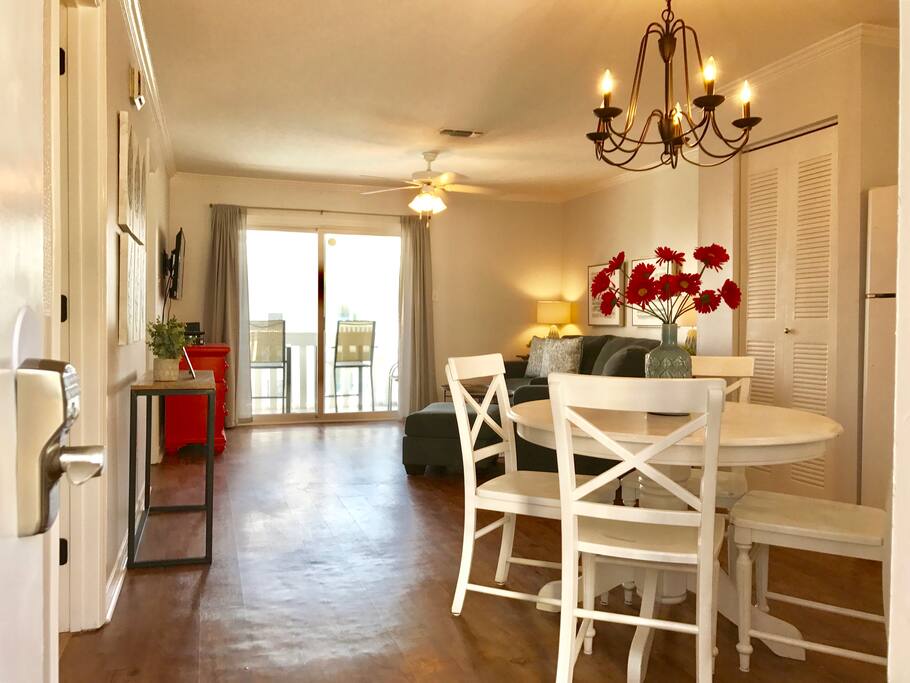 Enter through the eat-in kitchen that leads through the living room and onto the relaxing balcony