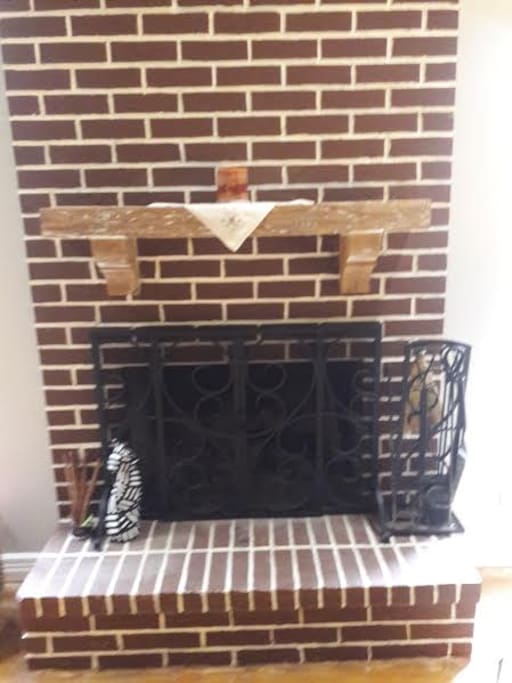 Wood burning fireplace for the enjoyment of those old Houston days.