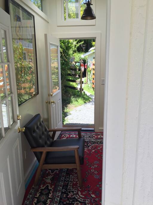 Standing on backdoor patio looking toward front door. Nice way to let the breeze flow through.