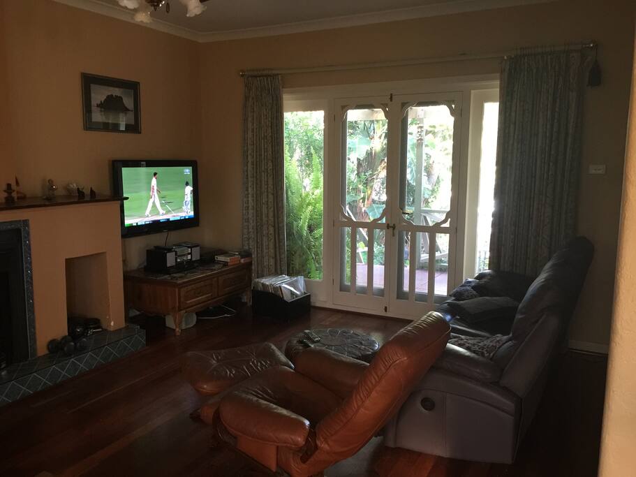 Watch TV or listen to music in comfort on the recliner couches.