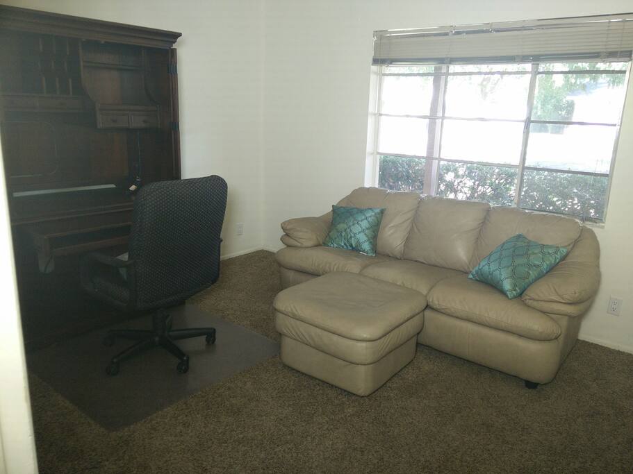Work station, comfortable Euro style queen bed.