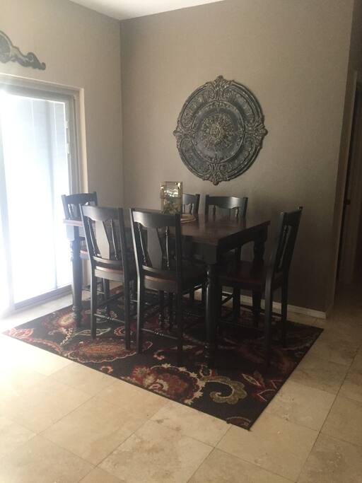 Breakfast nook which overlooks gorgeous patio and backyard