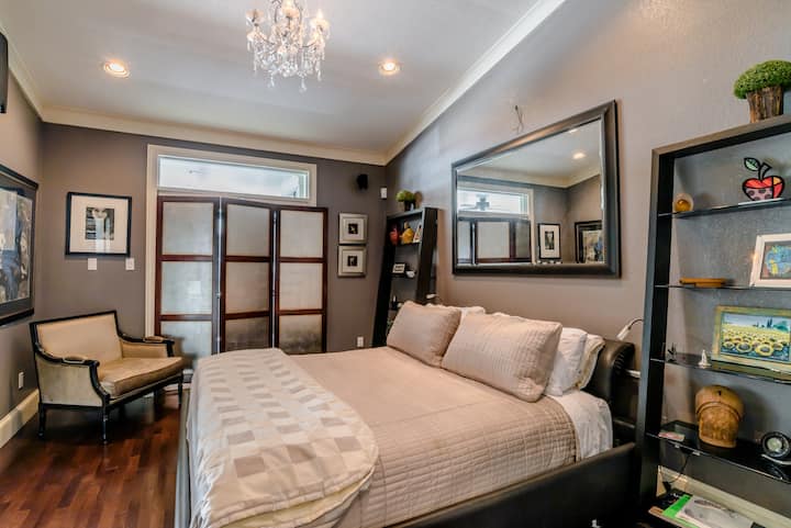 Guest bedroom number two has a king size bed and smart TV