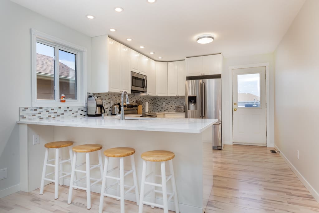 Renovated kitchen with quartz countertops