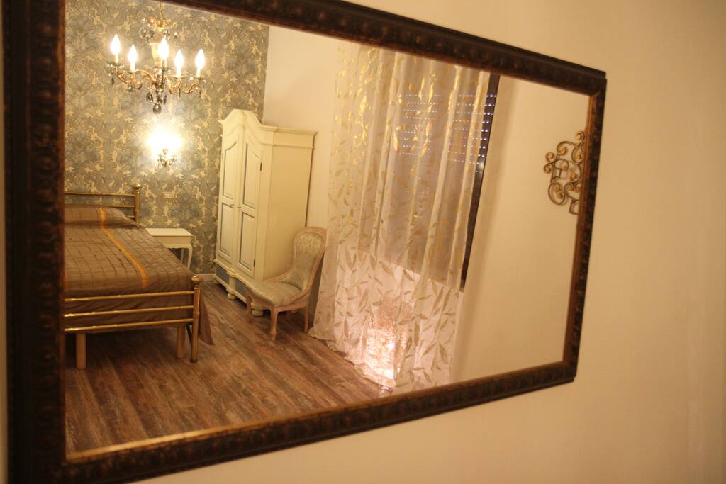 the large room with double bed (king size) and double sofa bed