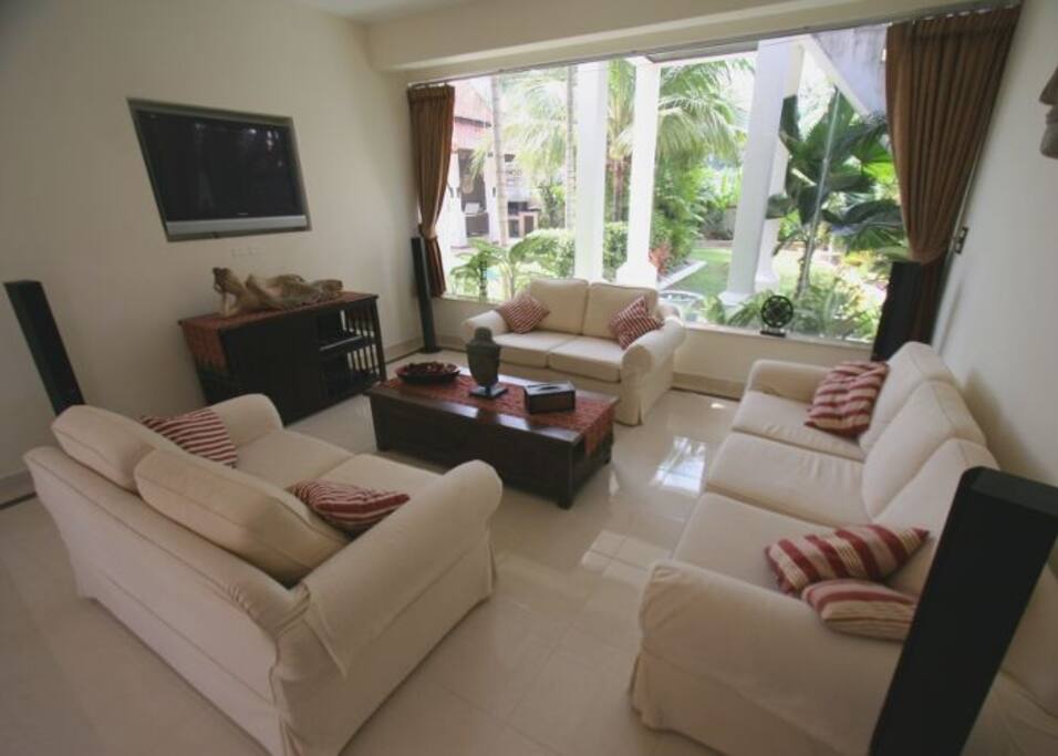 White sofa and flatscreen TV