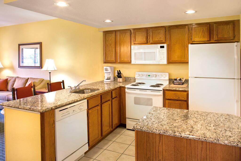 The kitchen is stocked with all the equipment for preparing a great meal.