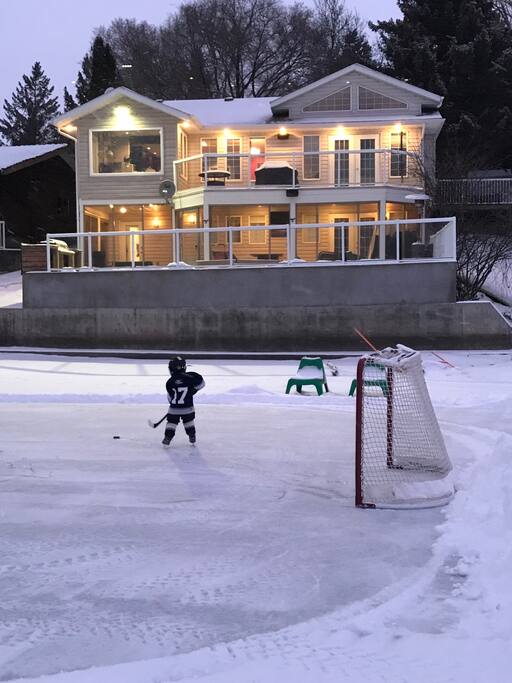 Winter skating rink right outside the house.