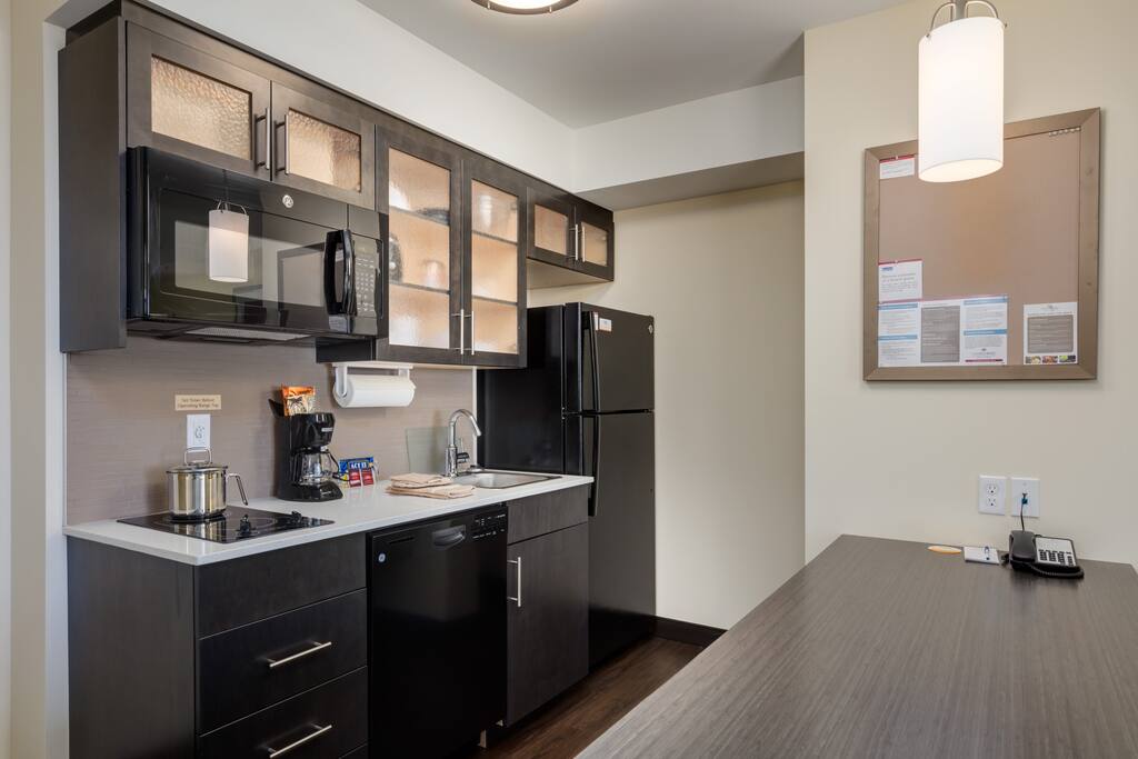 Full Kitchen (including full size fridge, microwave, dishwasher and stove top)
