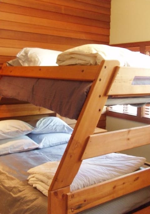 Full size bed with single bunk. Not shown in pic is the flat screen tv and gaming devices.