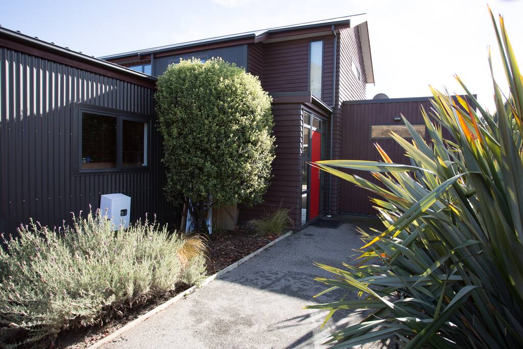 Entrance with red door.