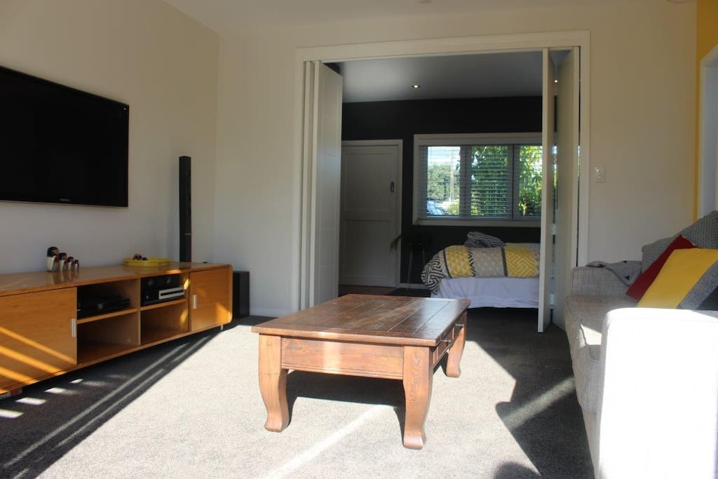 Private lounge with TV and DVD player. Private front door.