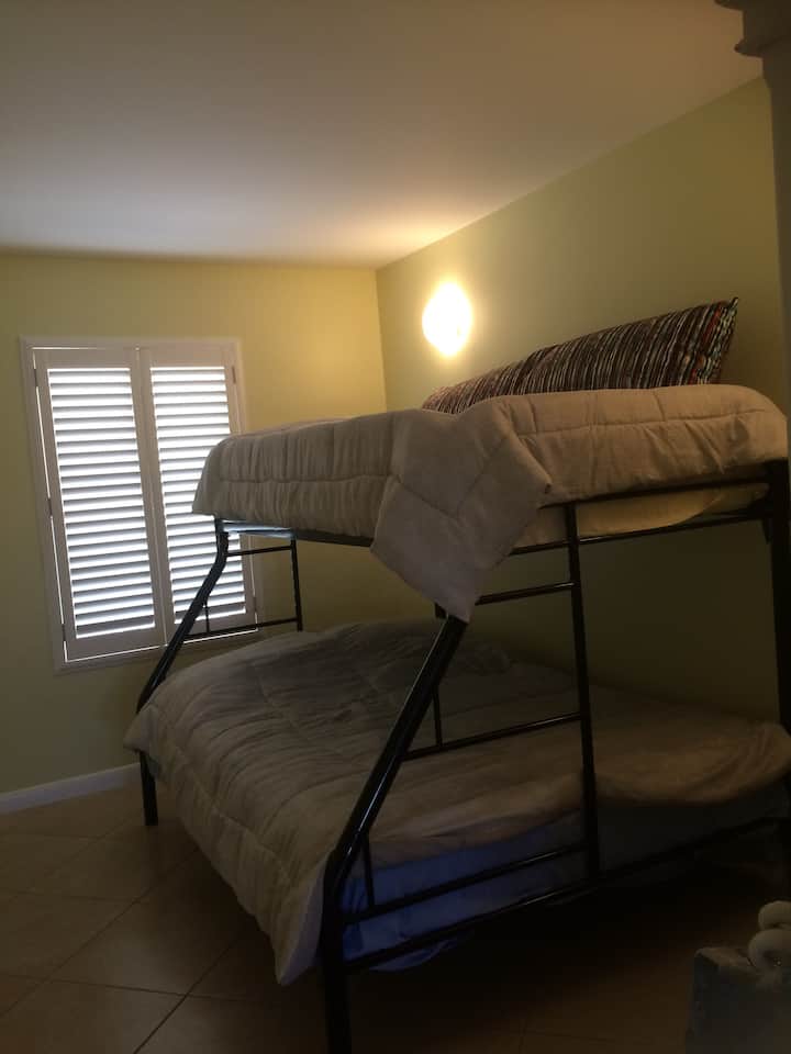 Bunk beds with full bottom and single top possible to sleep 3 children or 2 older teen