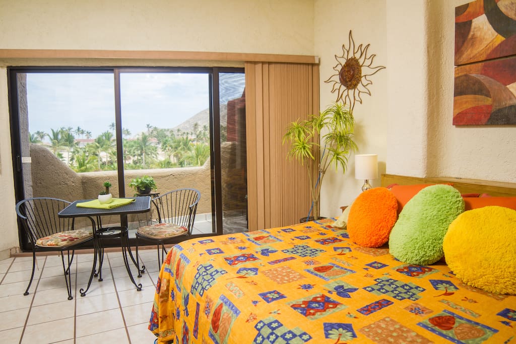 Room has vertical blinds that twist to let the morning sunshine in or twist the other way for privacy.