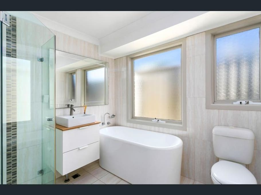 Main bathroom with separate outdoor laundry and toilet
