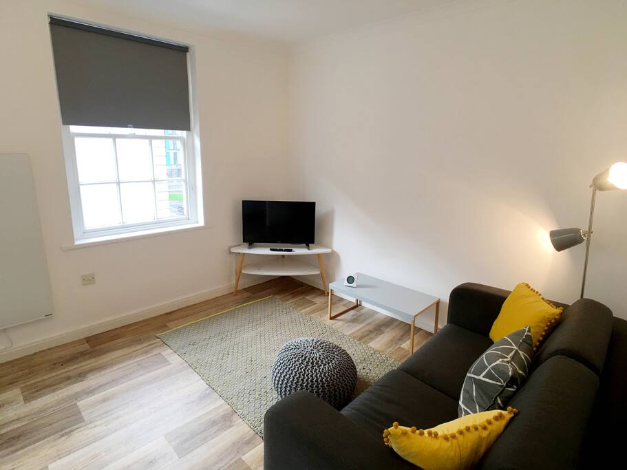 Relax in the lounge, watch the smart TV or watch the world go by in the historic Georgian square outside