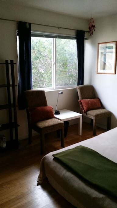 Guest room. Low futon mattress. There is now a small desk below the window.