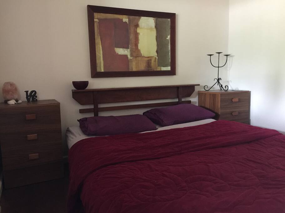 Futon bed with Egyptian cotton sheets.