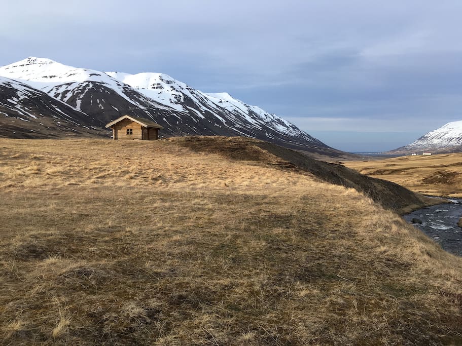 The hut and Ólafsfjördur in the background